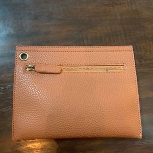 Brown leather wristlets